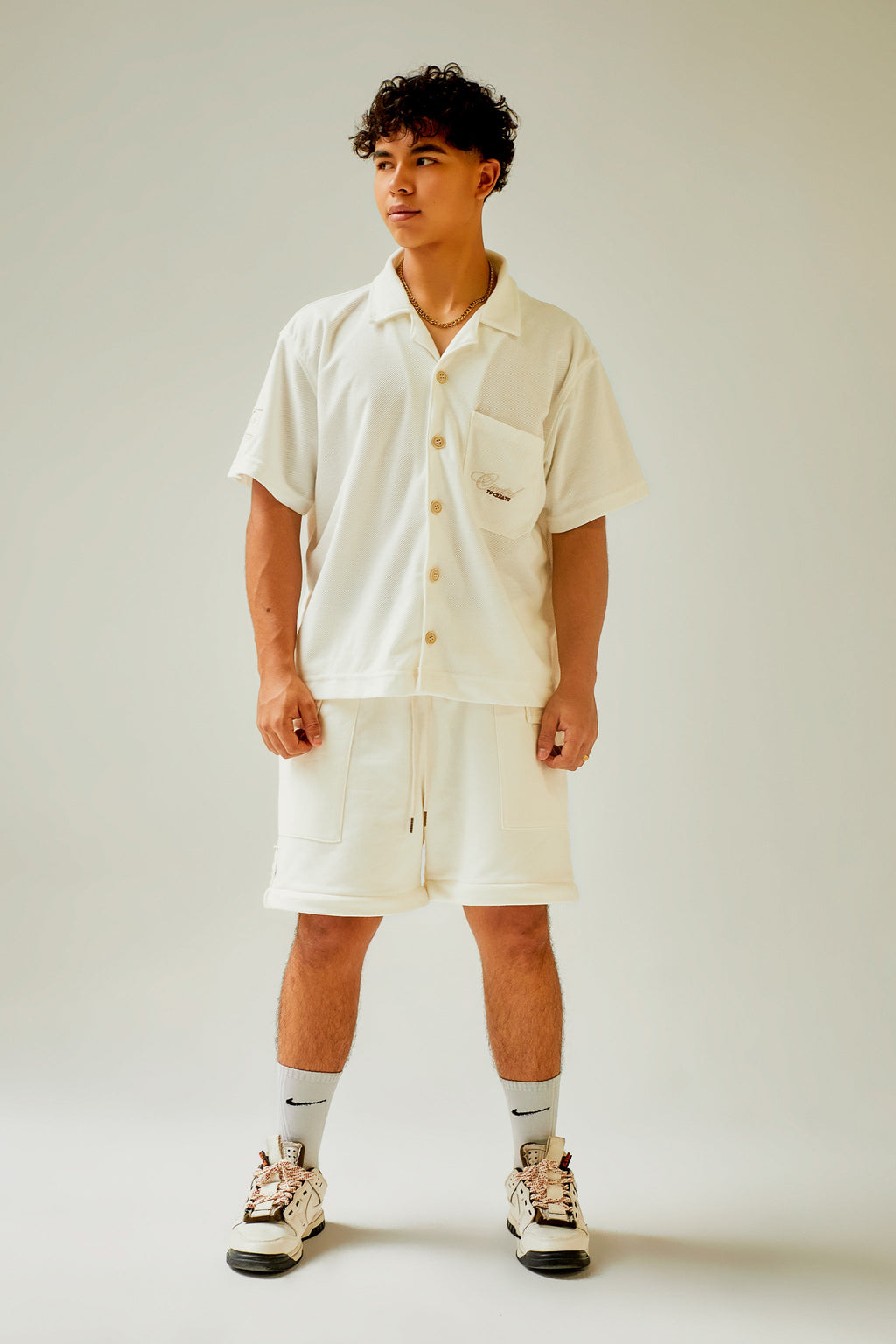 Camisa ivory manga corta con bolsillo bordado Kavans