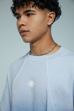 Camiseta boxy fit con cortes y degradado en azules Kavans