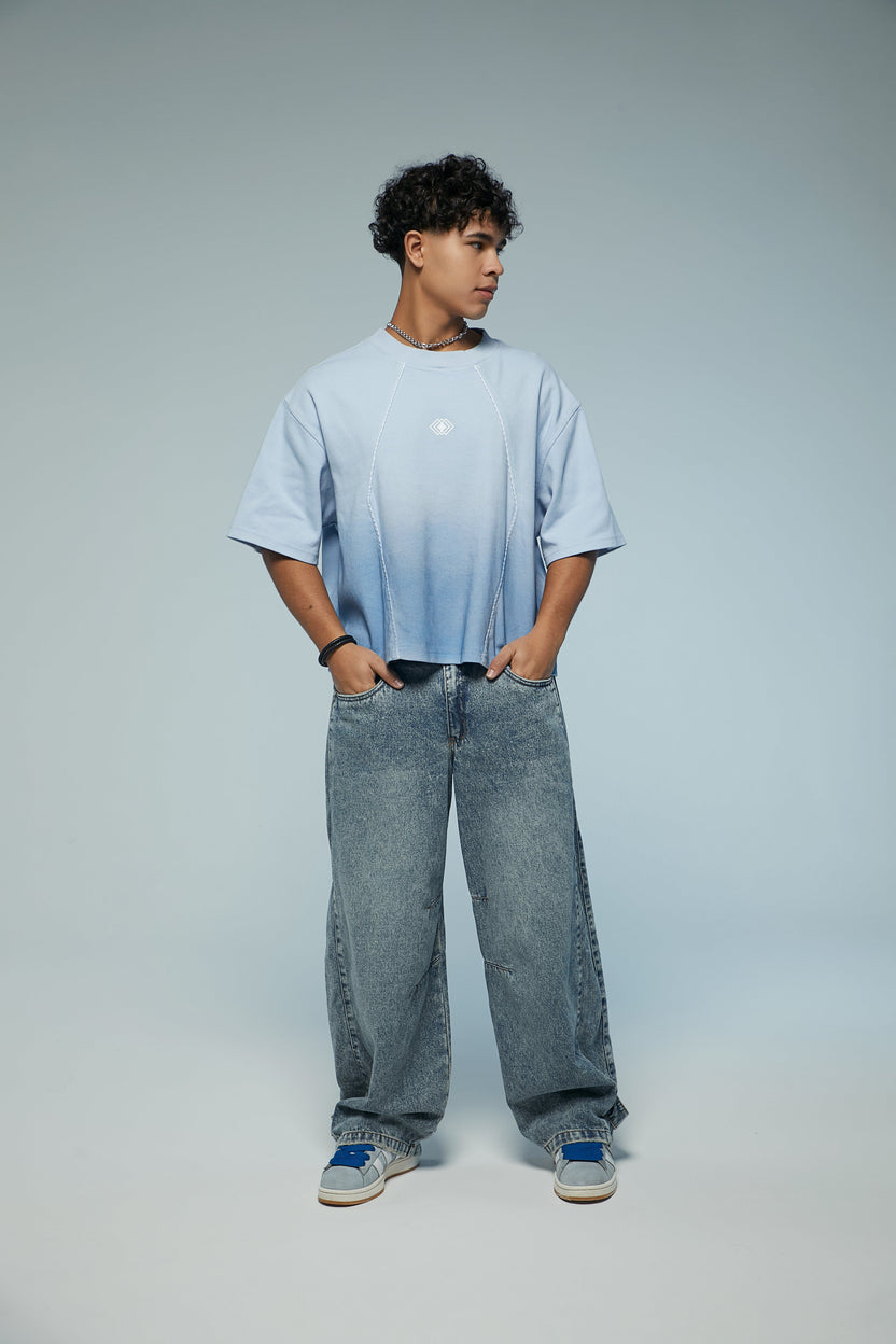 Camiseta boxy fit con cortes y degradado en azules Kavans