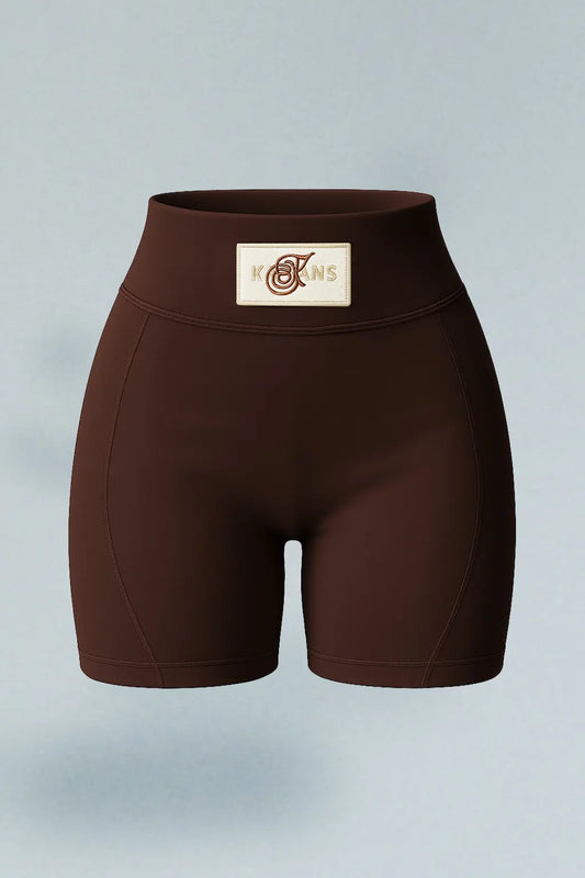 Biker deportivo chocolate con cortes y aplique Kavans
