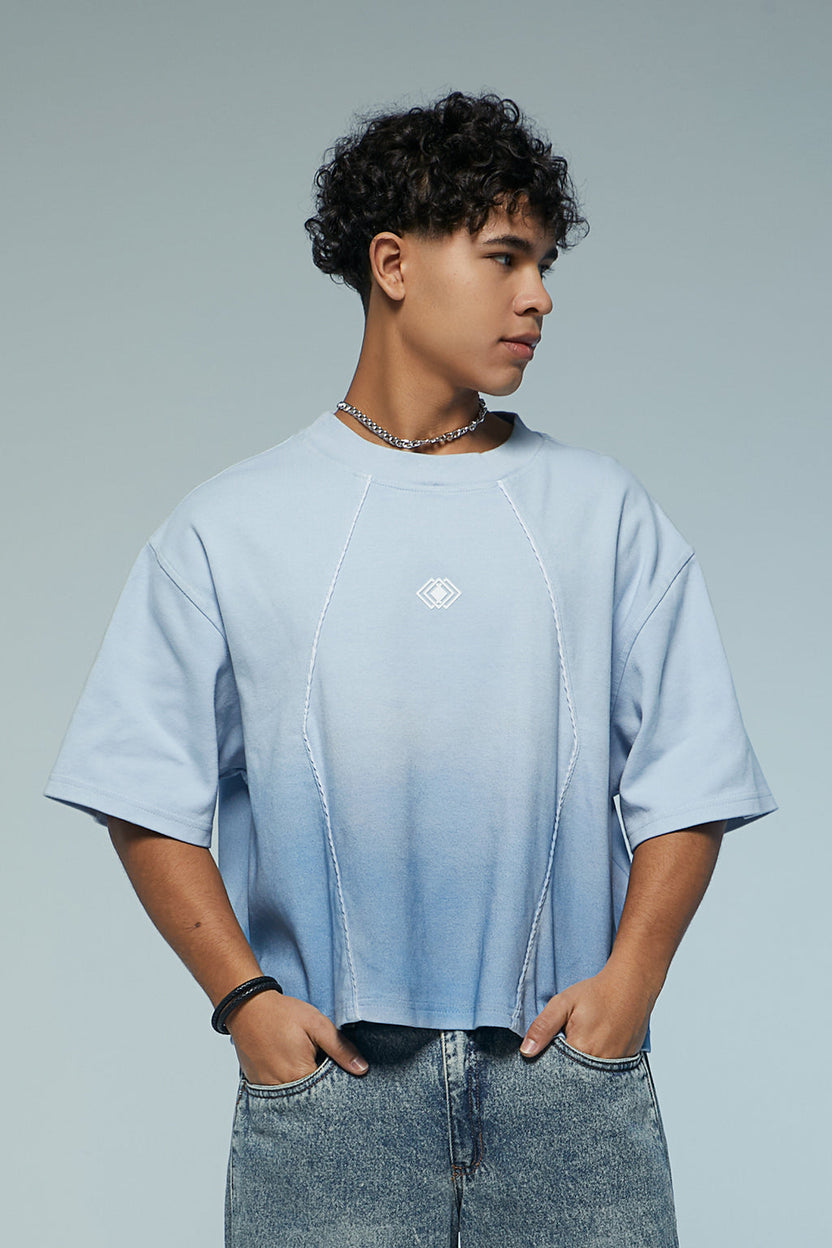 Camiseta boxy fit con cortes y degradado en azules Kavans
